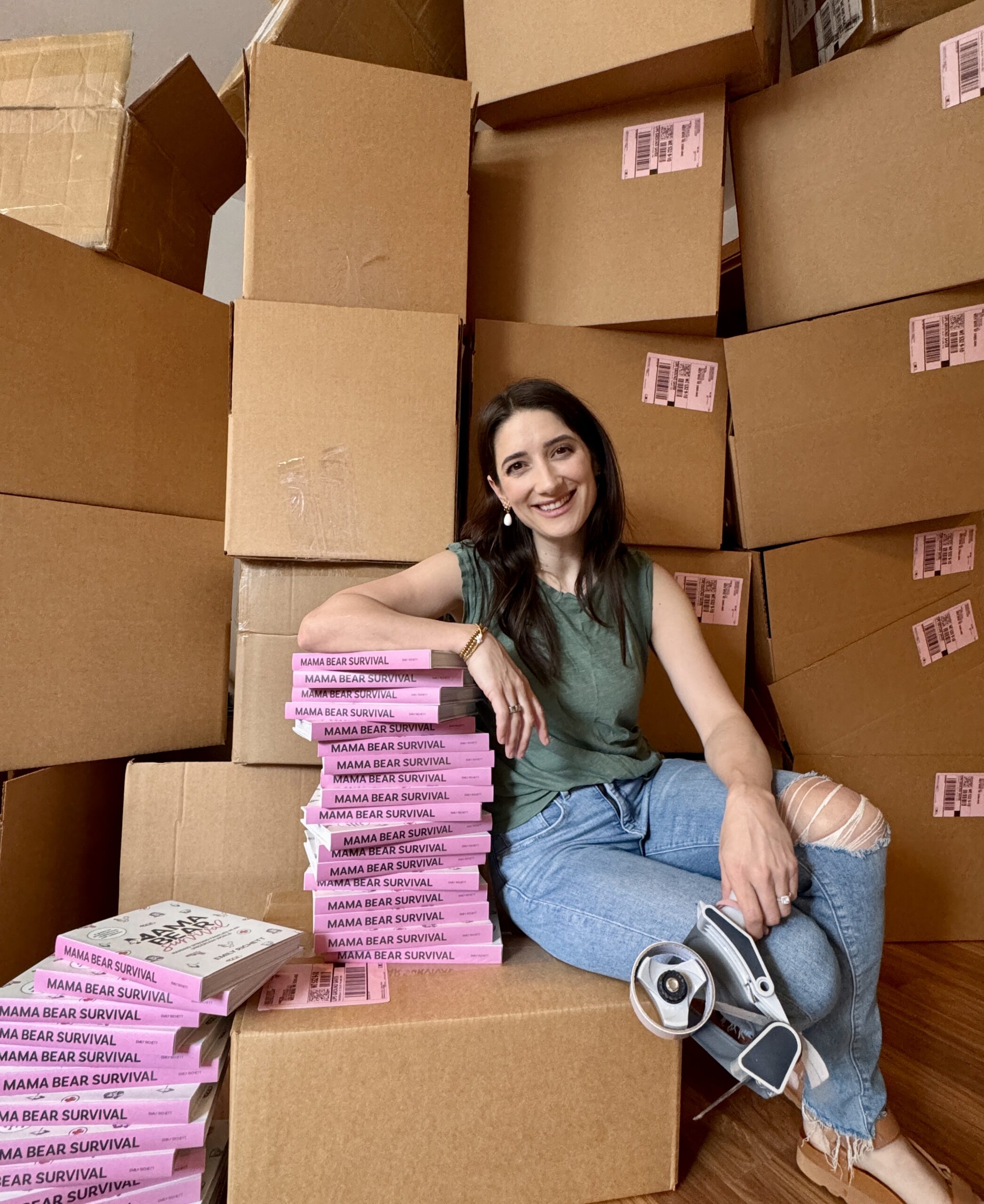 Author Emily Richett posing with her newly released book Mama Bear Survival.