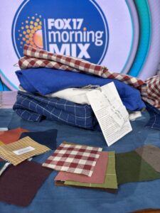 Stack of linen clothing on news set