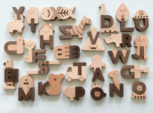 Wooden alphabet blocks with corresponding toy blocks